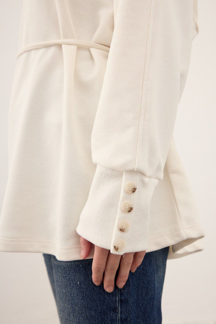 White sweater with buttons