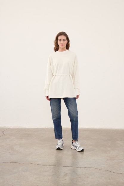 White sweater with buttons